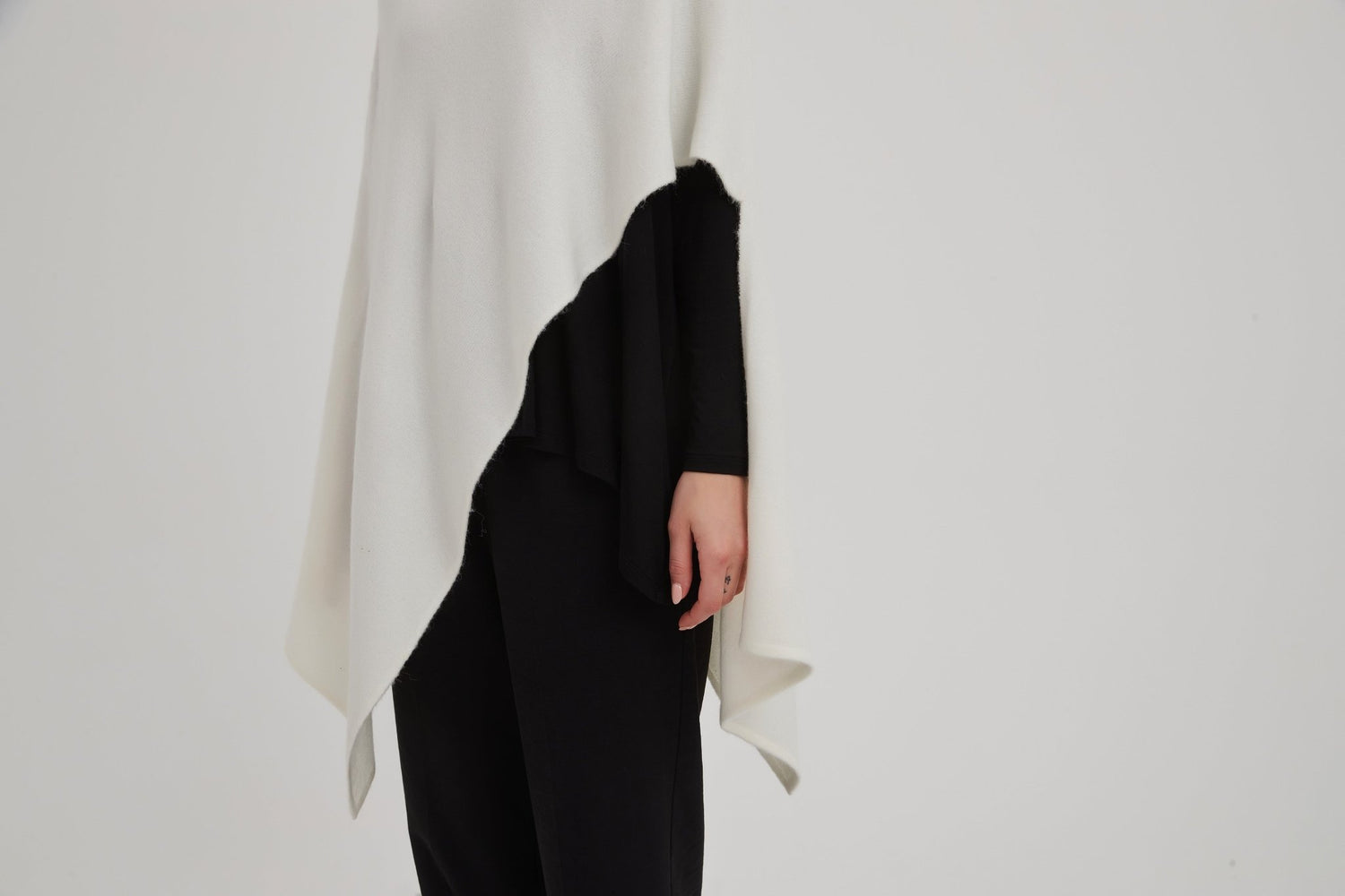 TirelliTirelli Button Detail Asymmetric PonchoClothingCream - Blue Water Clothing