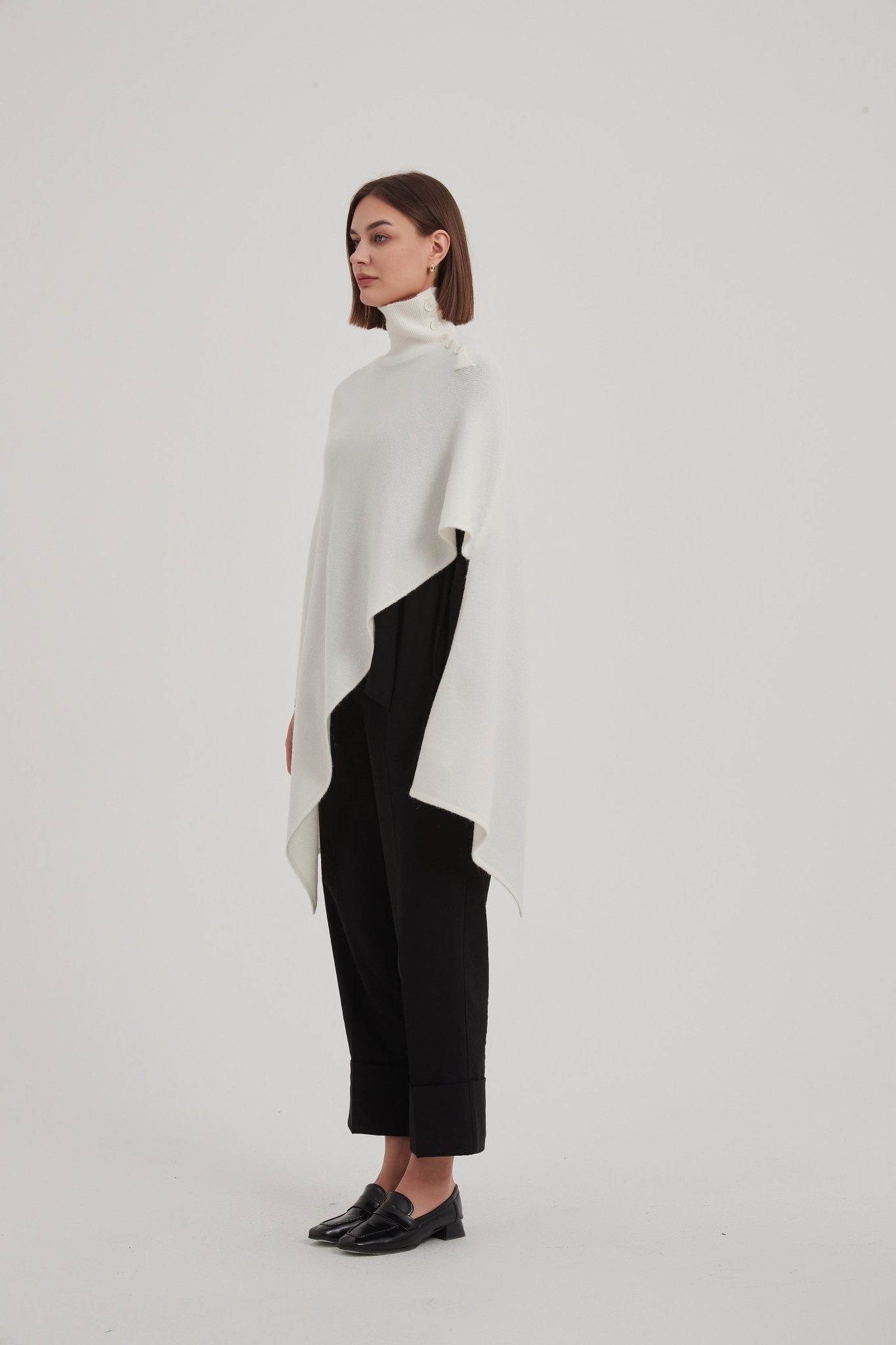 TirelliTirelli Button Detail Asymmetric PonchoClothingBlack - Blue Water Clothing