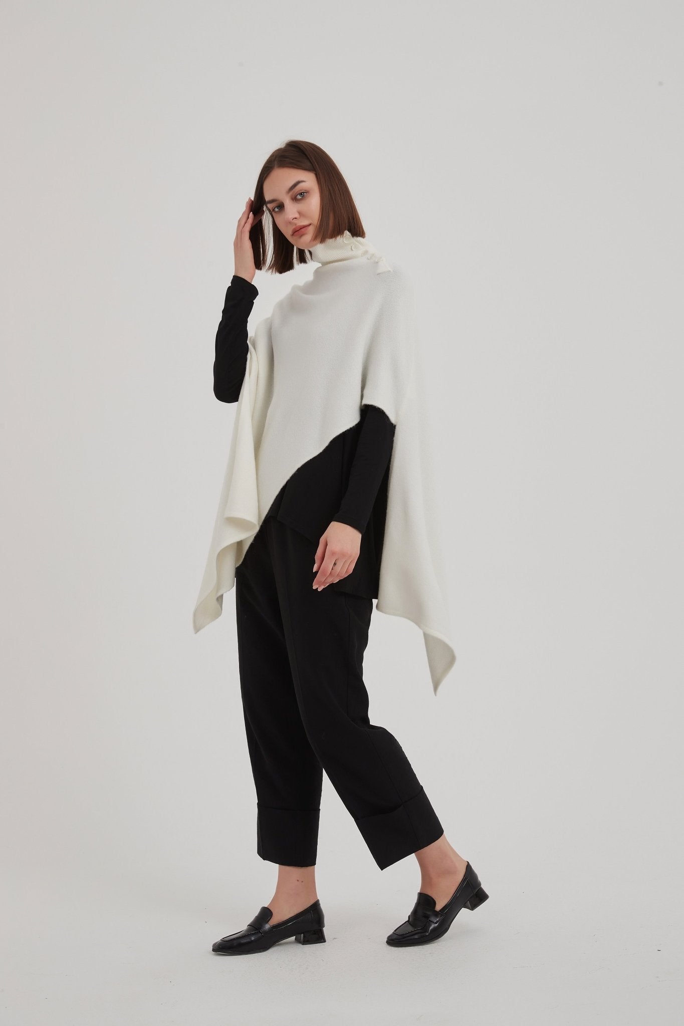 TirelliTirelli Button Detail Asymmetric PonchoClothingCream - Blue Water Clothing