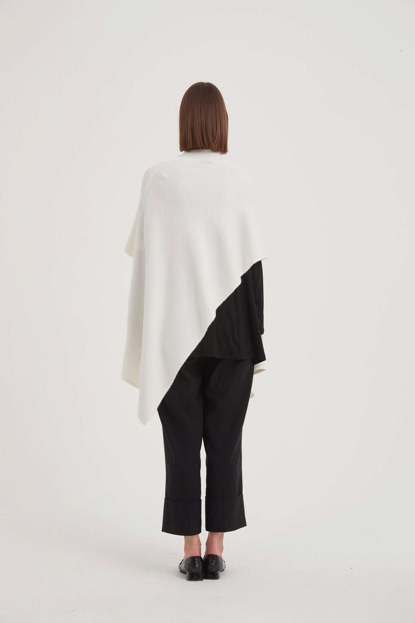 TirelliTirelli Button Detail Asymmetric PonchoClothingBlack - Blue Water Clothing
