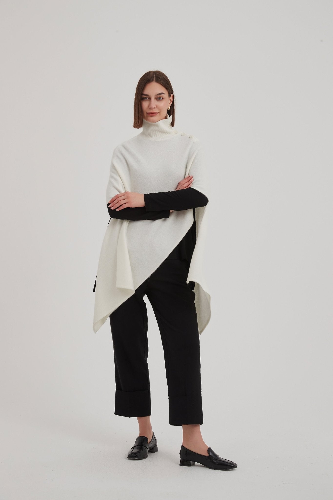 TirelliTirelli Button Detail Asymmetric PonchoClothingCream - Blue Water Clothing