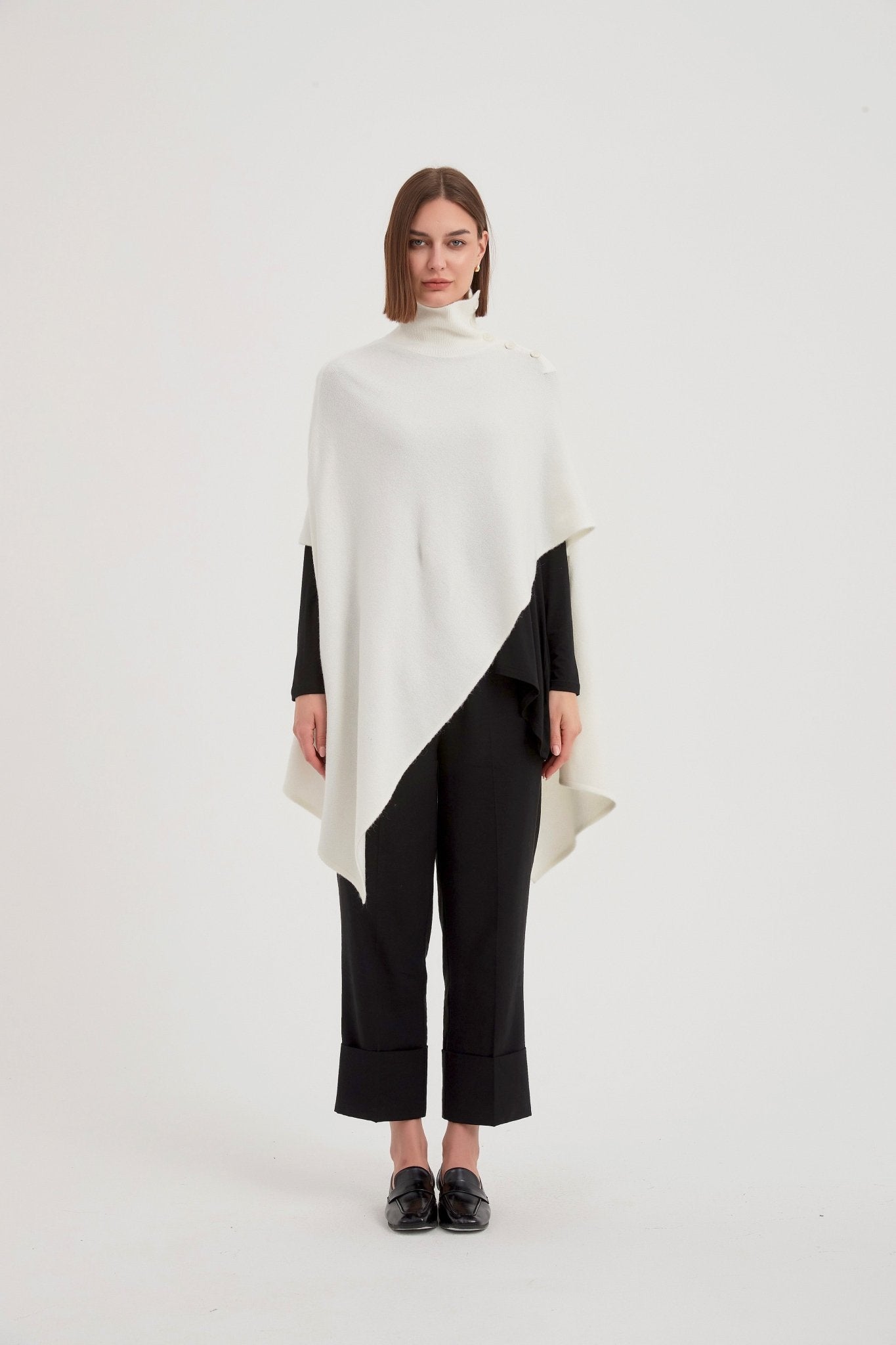 TirelliTirelli Button Detail Asymmetric PonchoClothingBlack - Blue Water Clothing