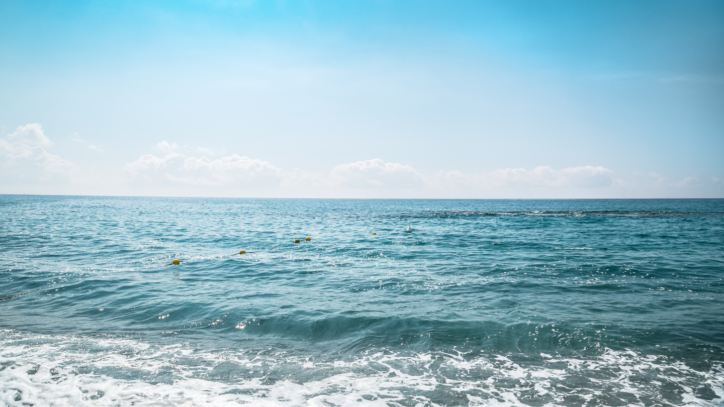 grainy summer ocean surf clear water